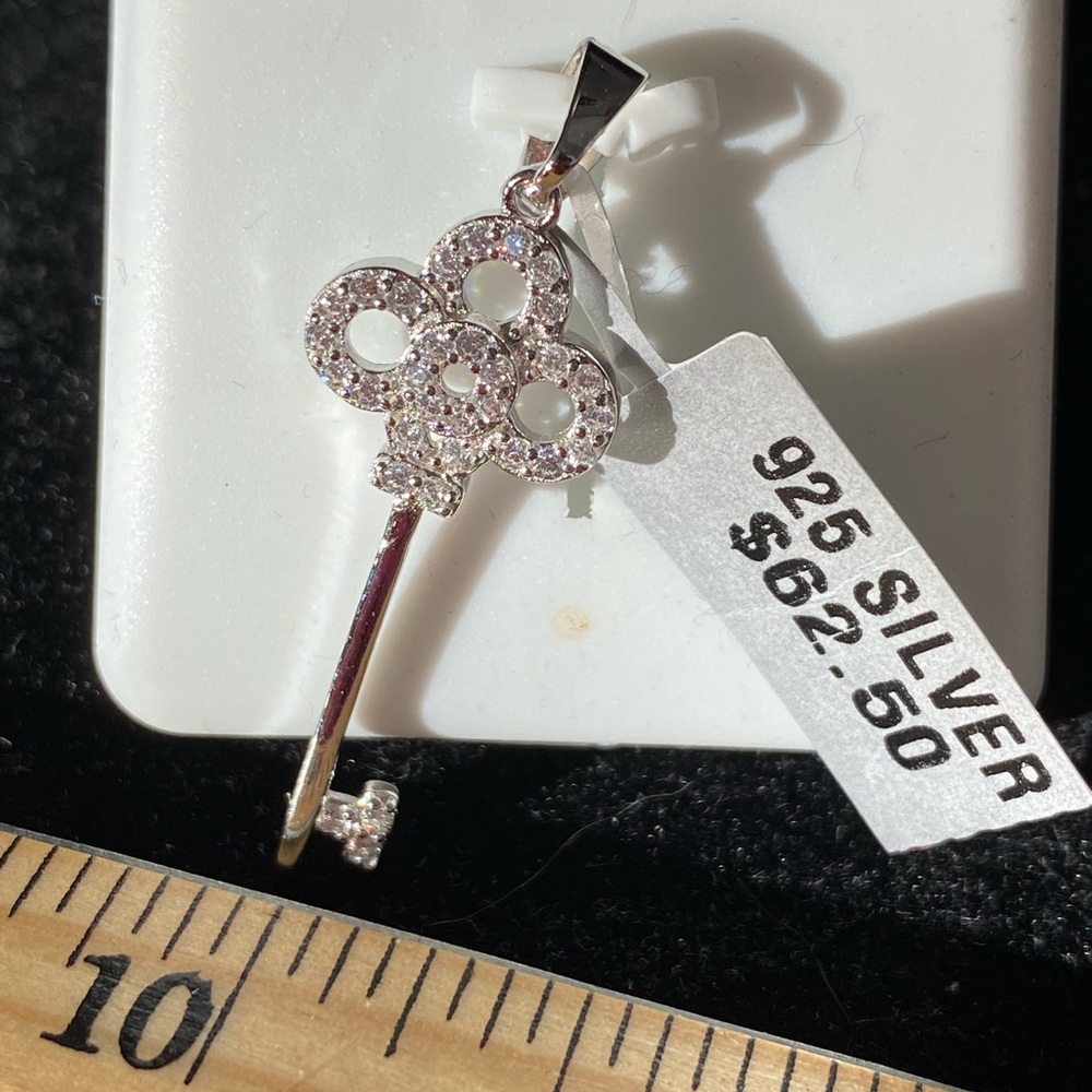 Silver and crystal key pendant